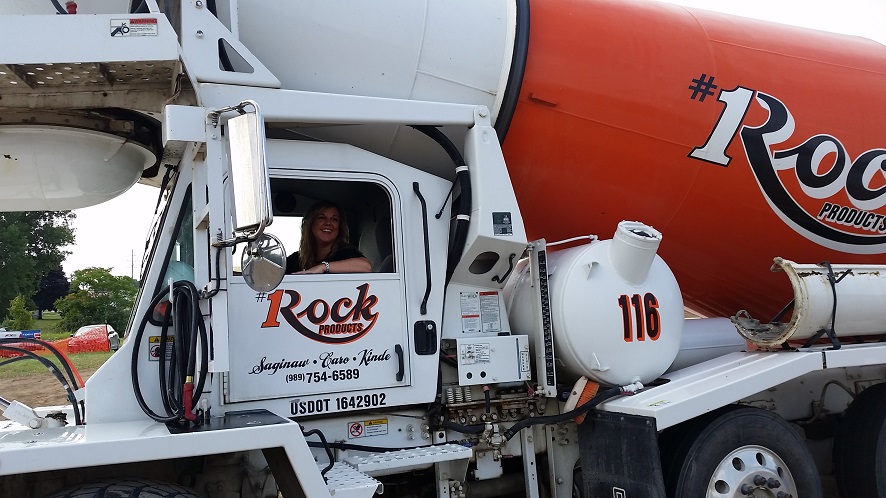 President/CEO of Mayville State Bank Pouring Cement 