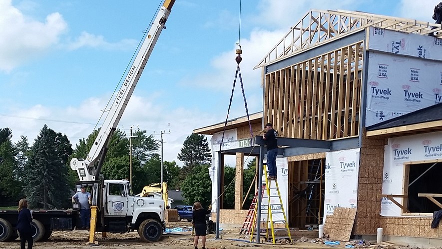 Signed Steel Beam going up