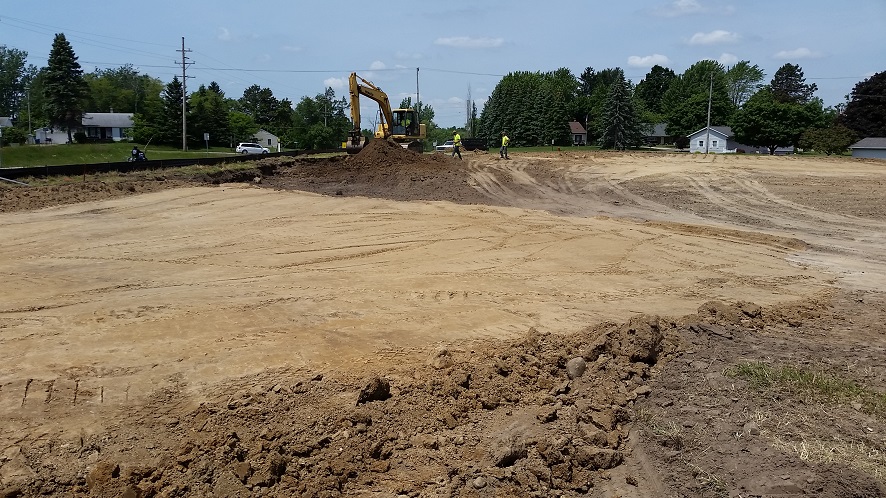 Workers Plowing Dirt 